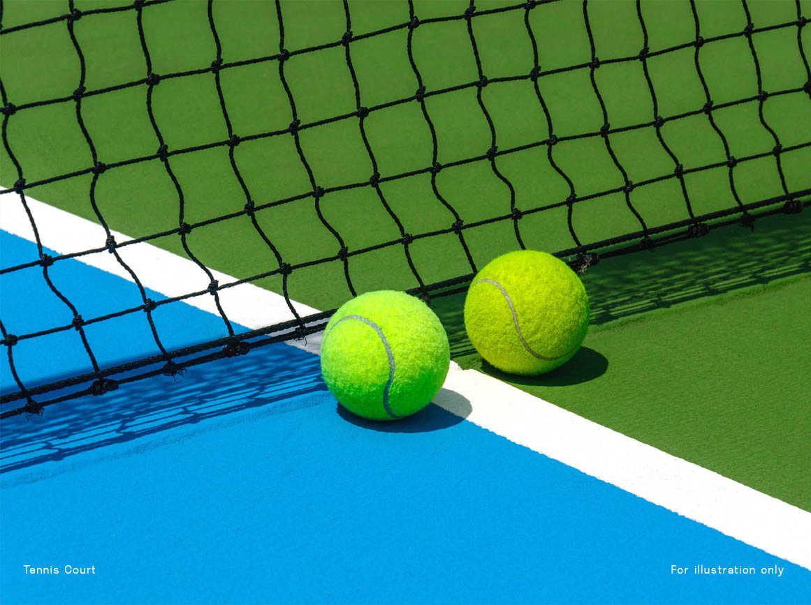 Two tennis balls on court
