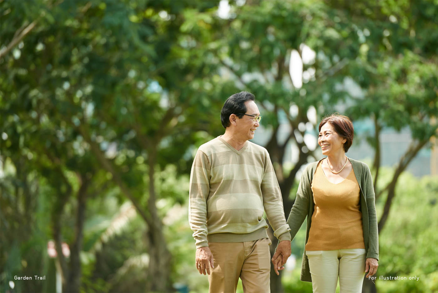 Happy Asian elderly couple enjoying date in city park